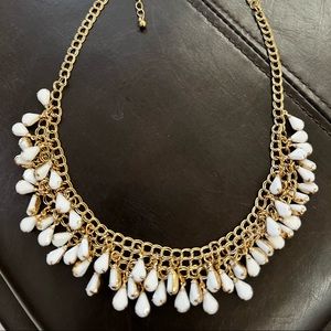 Necklace & earrings set, designed with white mat stones on a gold pleated chain